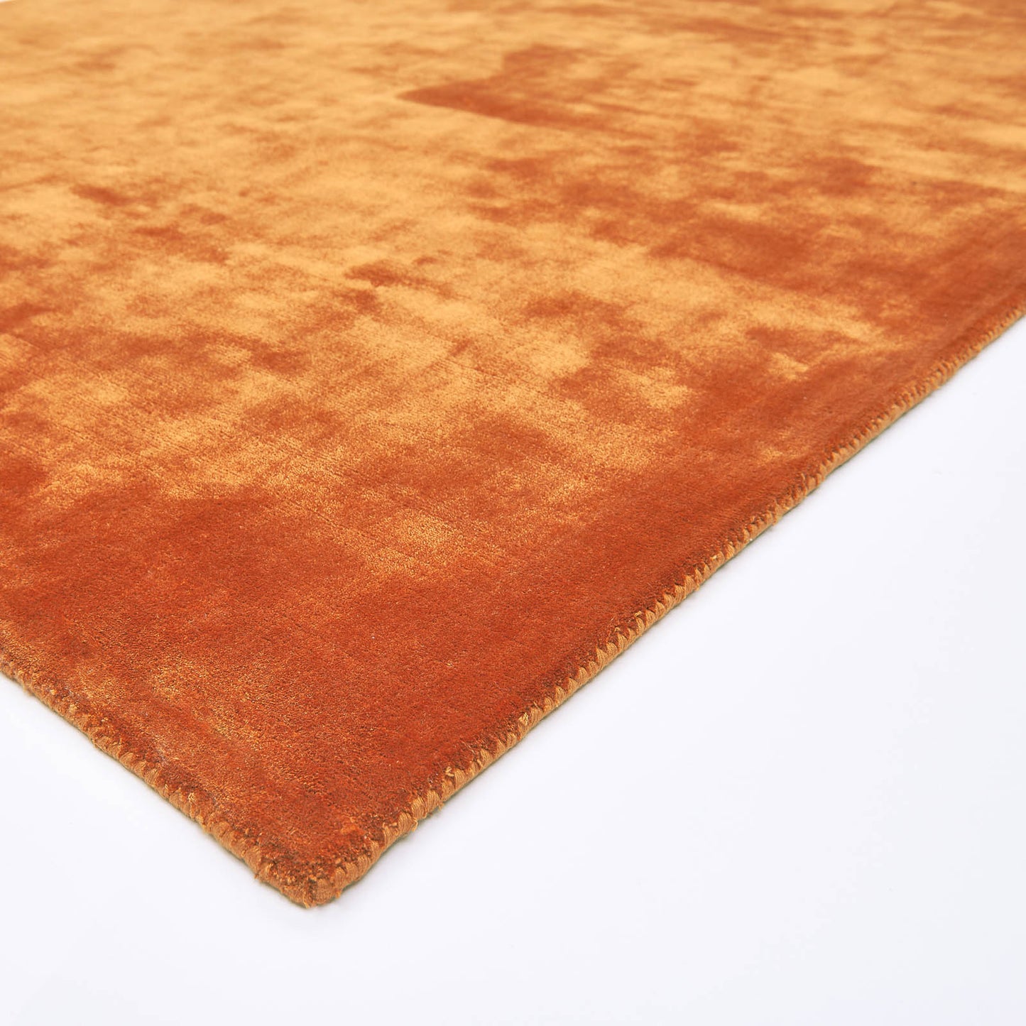 Katherine Carnaby Plain Chrome Designer Rug in Paprika