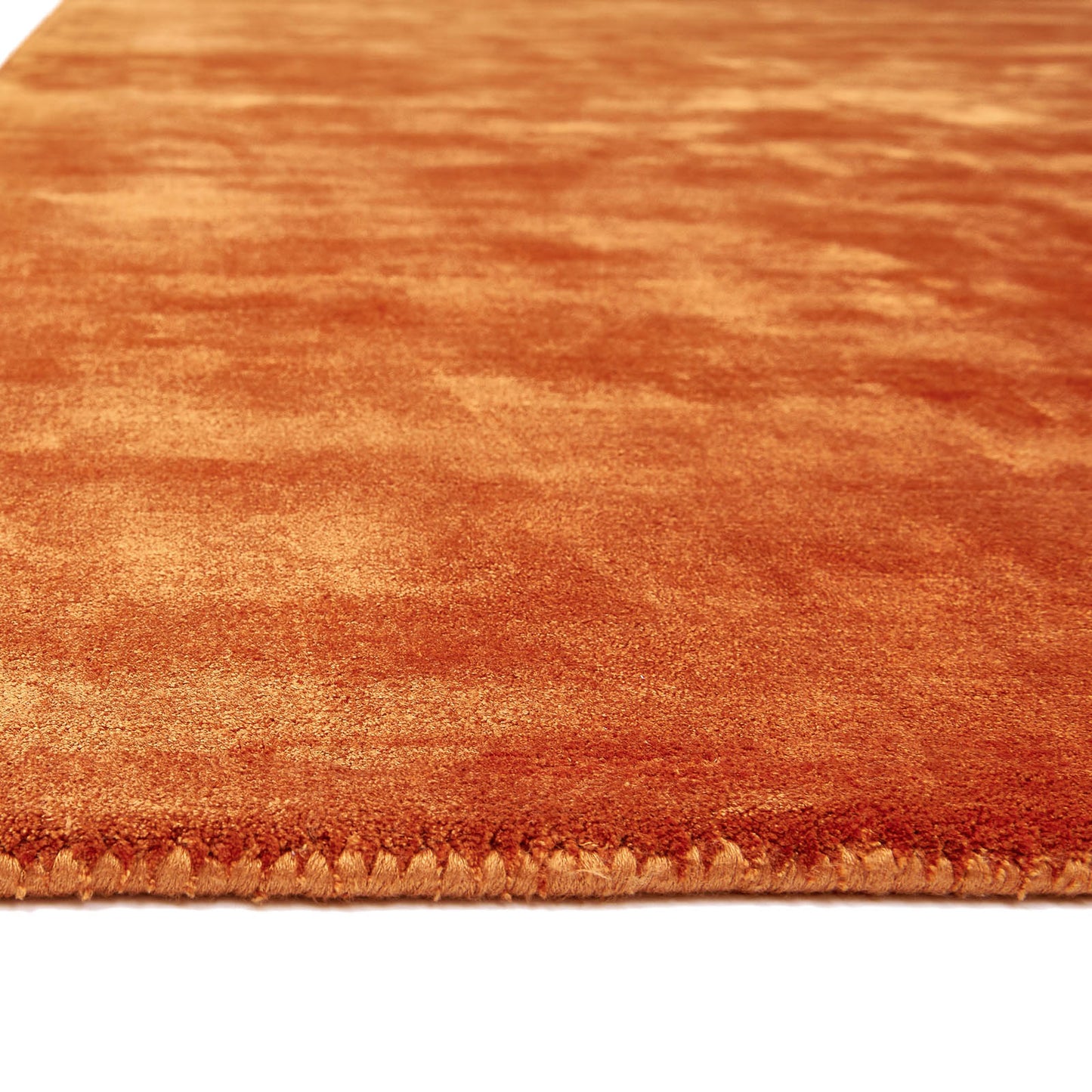 Katherine Carnaby Plain Chrome Designer Rug in Paprika