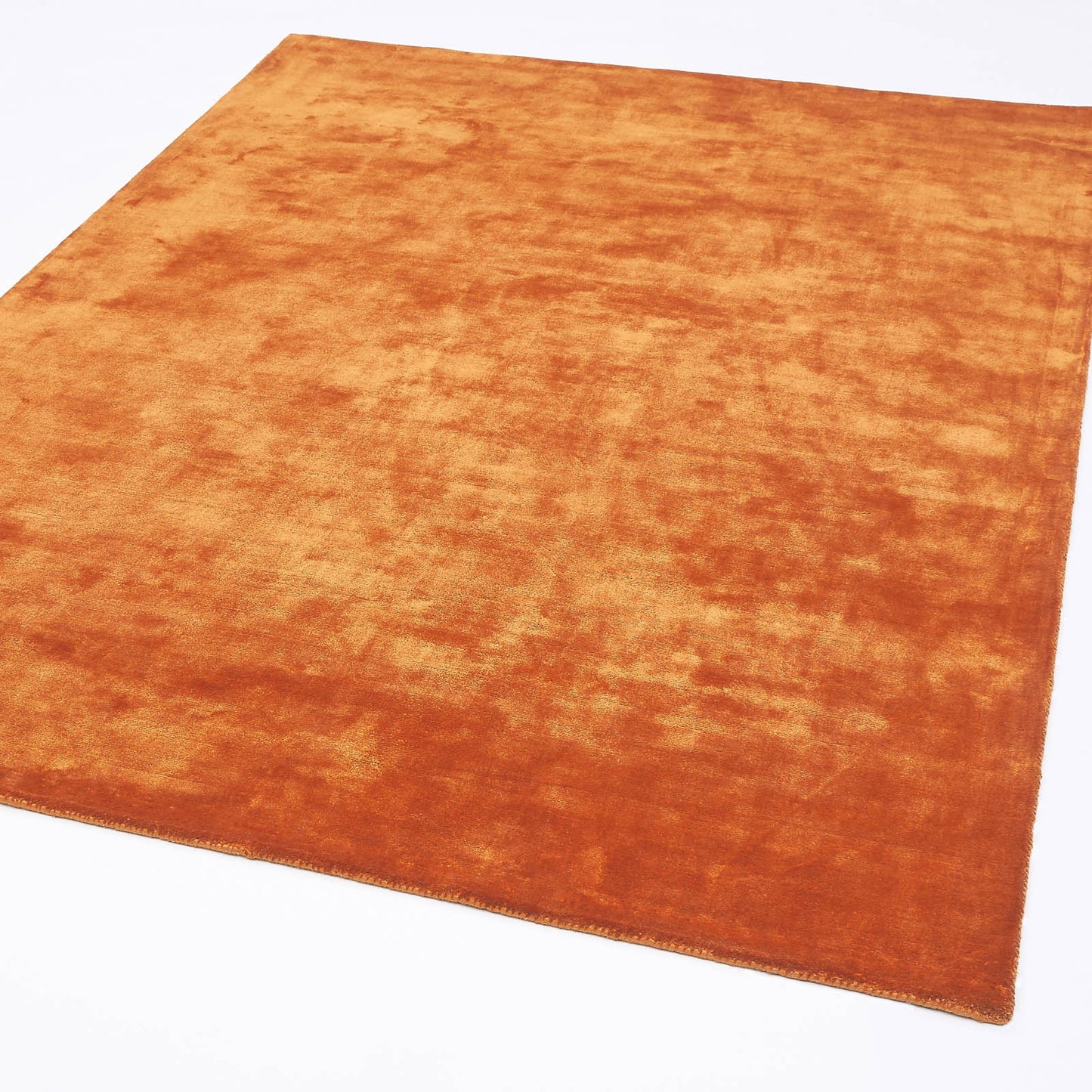 Katherine Carnaby Plain Chrome Designer Rug in Paprika