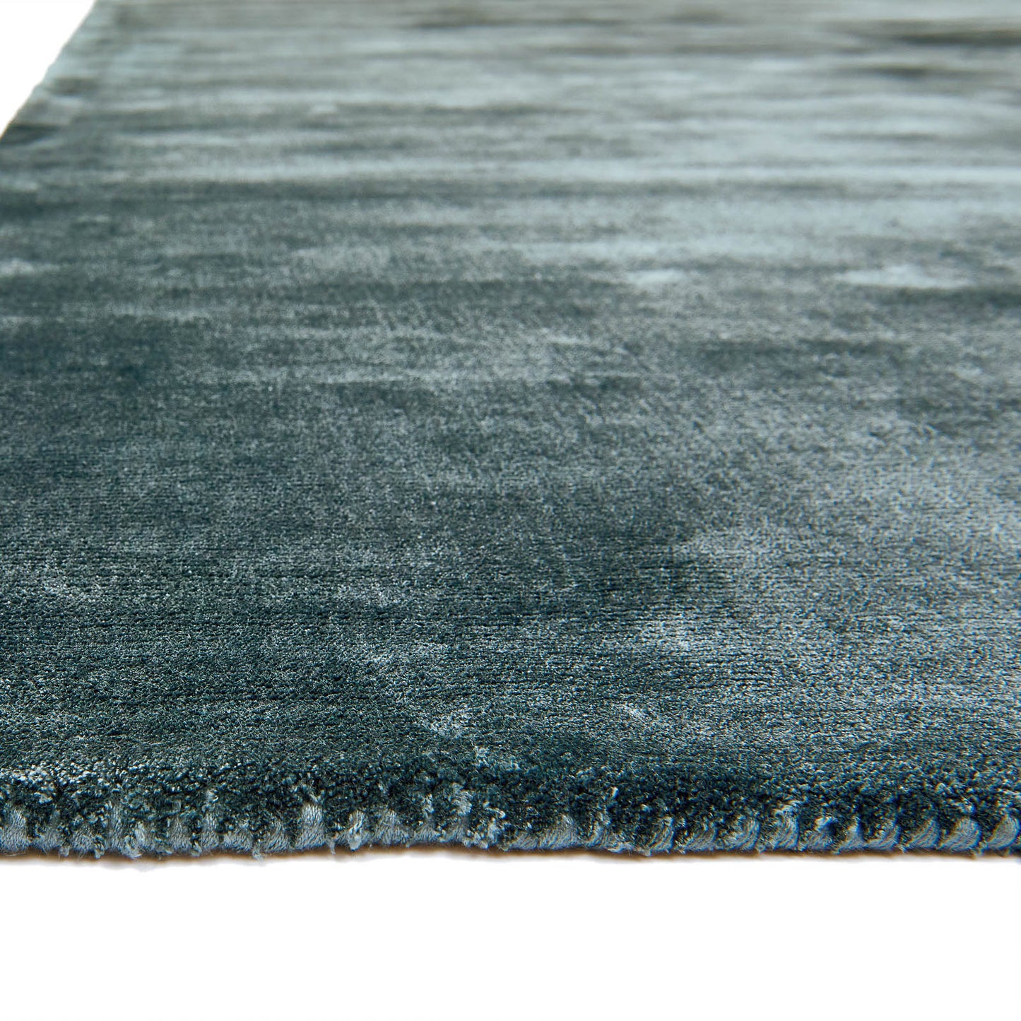 Katherine Carnaby Plain Chrome Designer Rug in Petrol