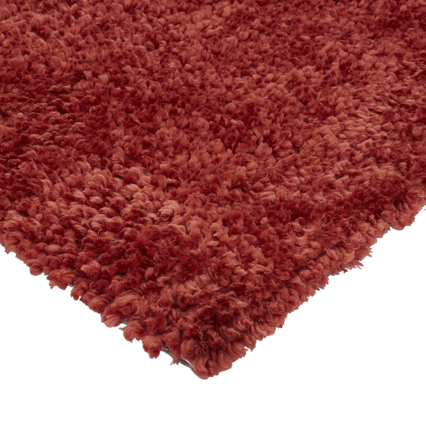 Spiral Plain Shaggy Rugs in Coral orange