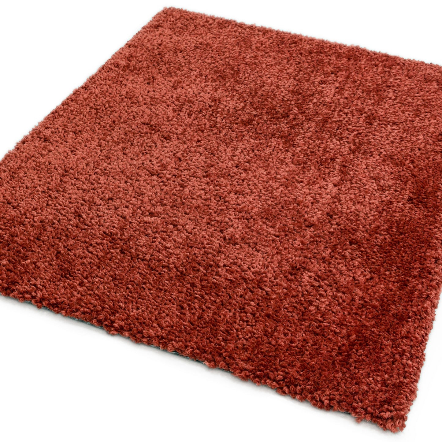 Spiral Plain Shaggy Rugs in Coral orange