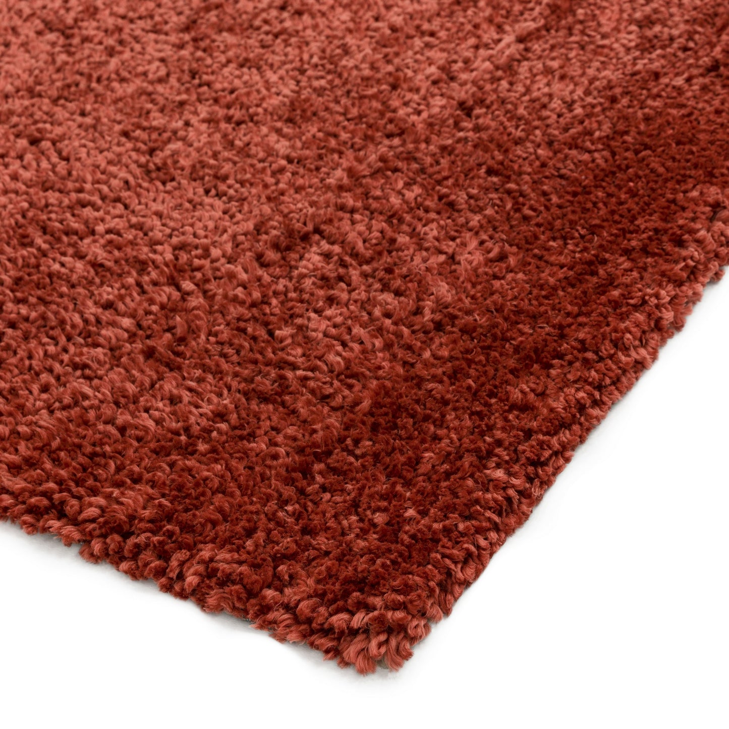 Spiral Plain Shaggy Rugs in Coral orange