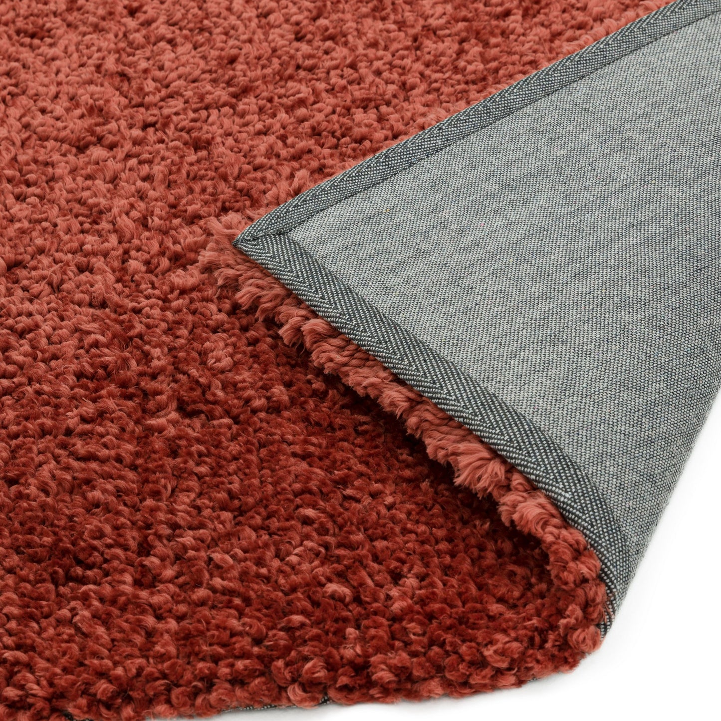 Spiral Plain Shaggy Rugs in Coral orange
