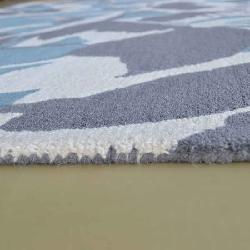 Cranes Rugs 57008 by Ted Baker in Petrol