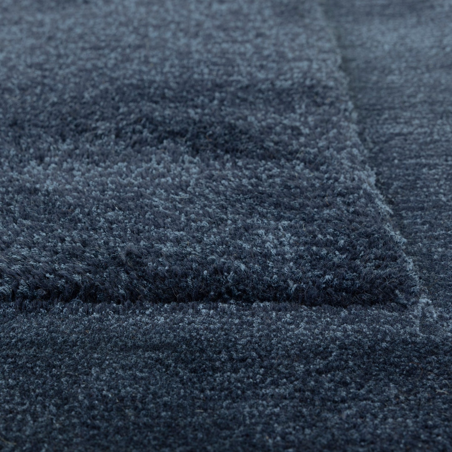 Rise Modern Plain Hand Carved Wool Rugs in Navy Blue
