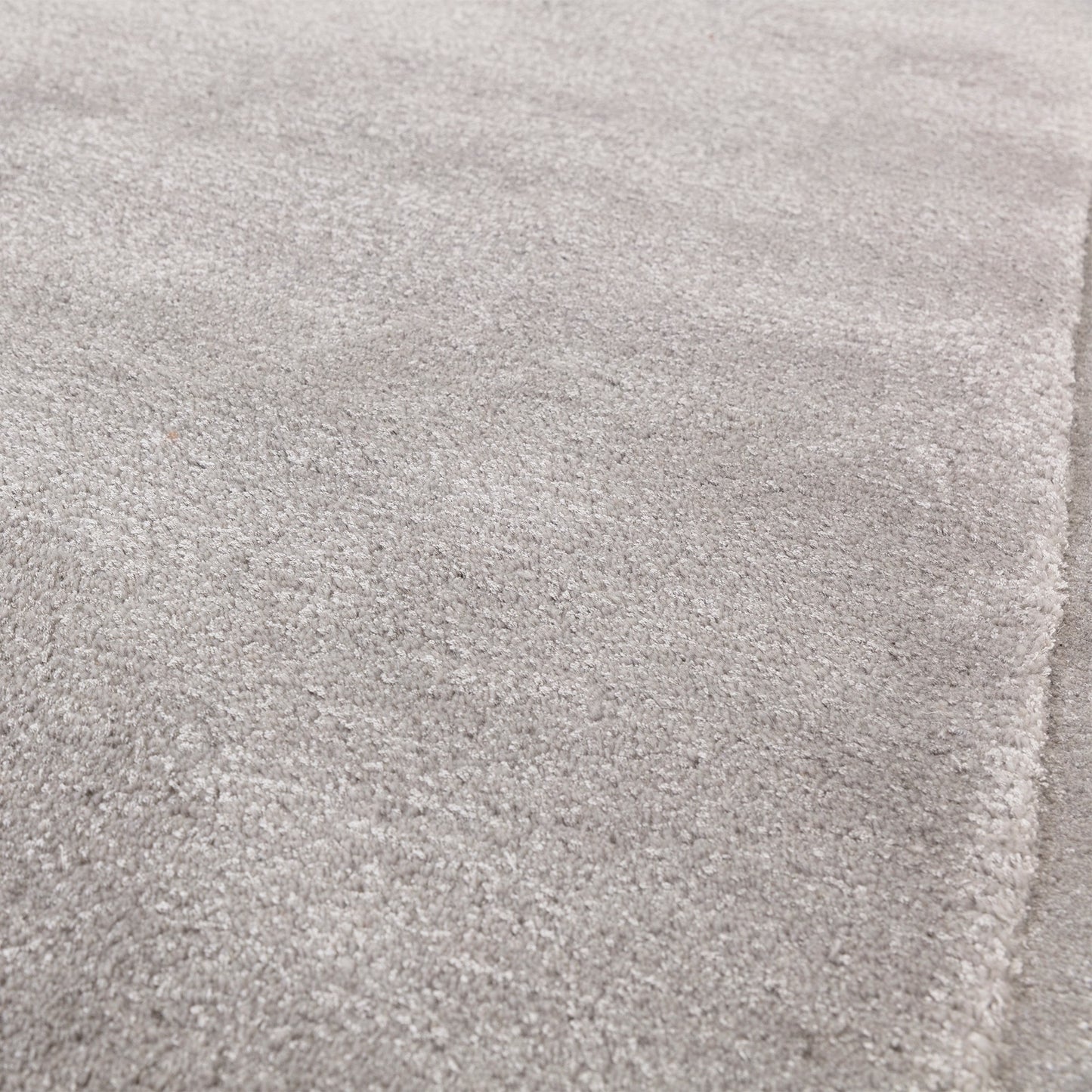 Rise Modern Plain Hand Carved Wool Rugs in Silver Grey
