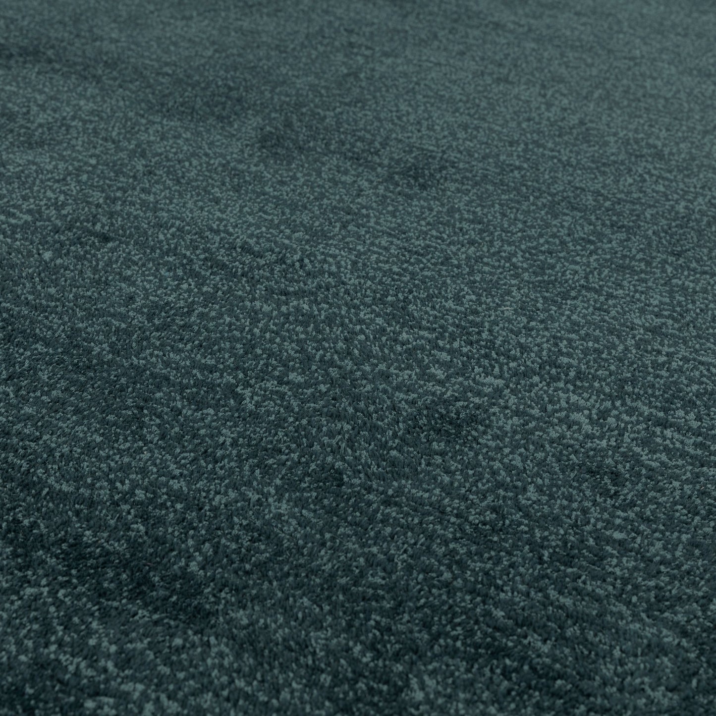 Rise Modern Plain Hand Carved Wool Rugs in Teal Blue