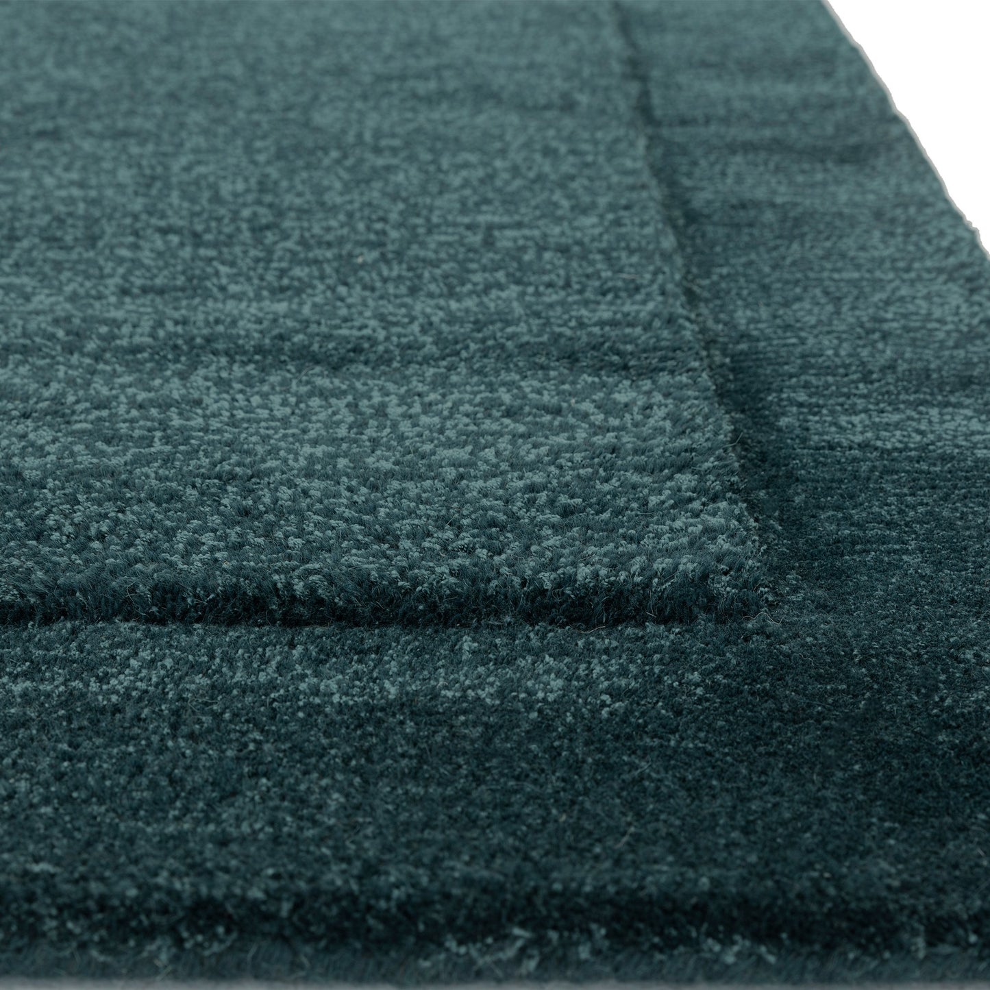 Rise Modern Plain Hand Carved Wool Rugs in Teal Blue