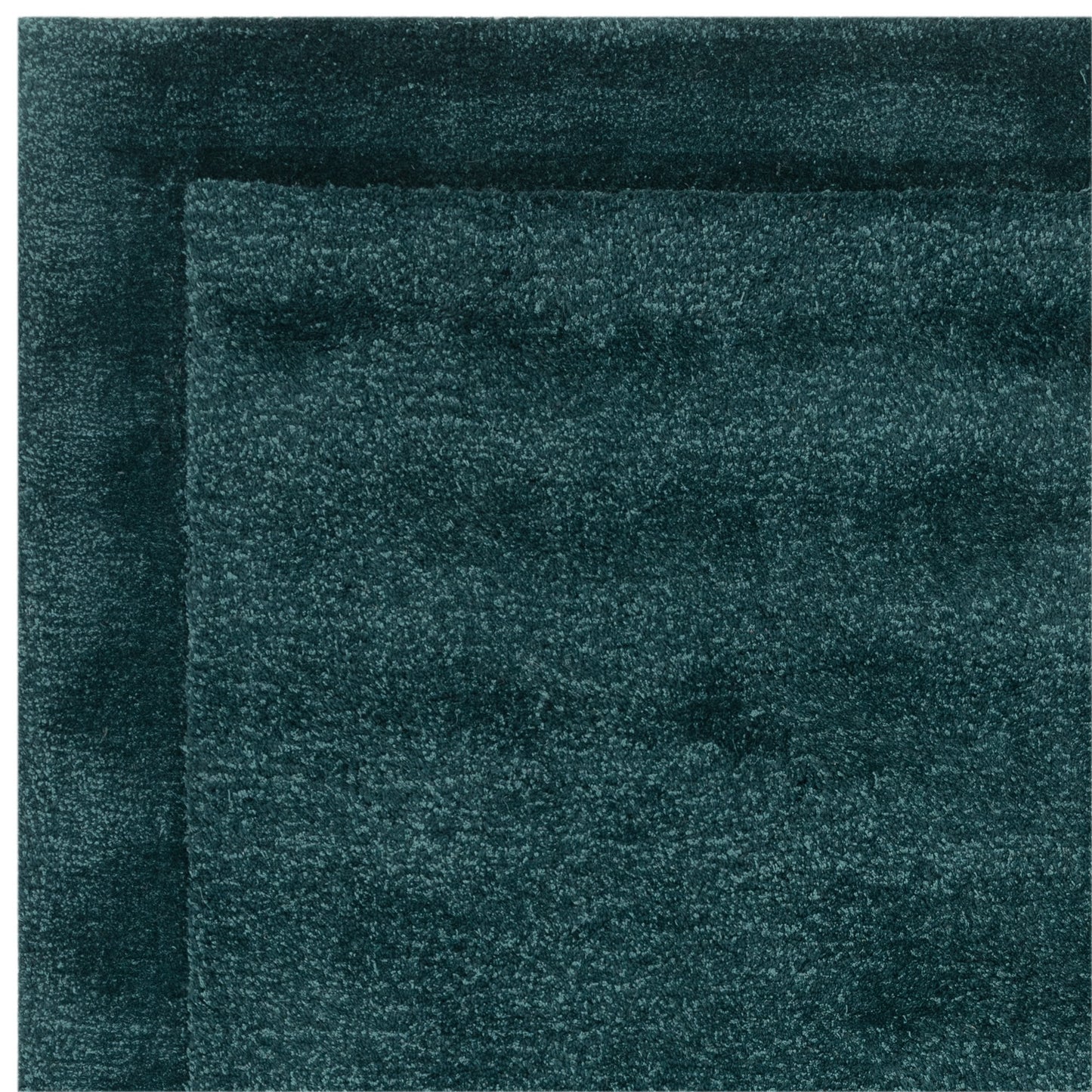 Rise Modern Plain Hand Carved Wool Rugs in Teal Blue