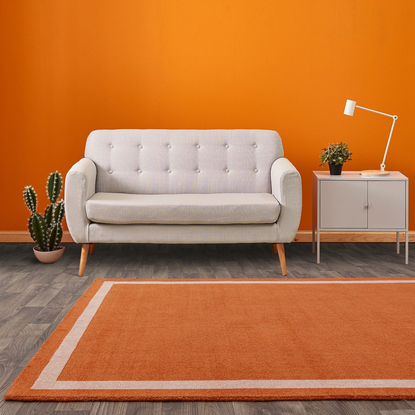 Albi Border Plain Classic Wool Rugs in Orange