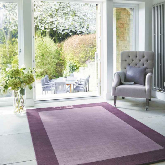 Origins Borders Plain Wool Rugs in Mauve Purple