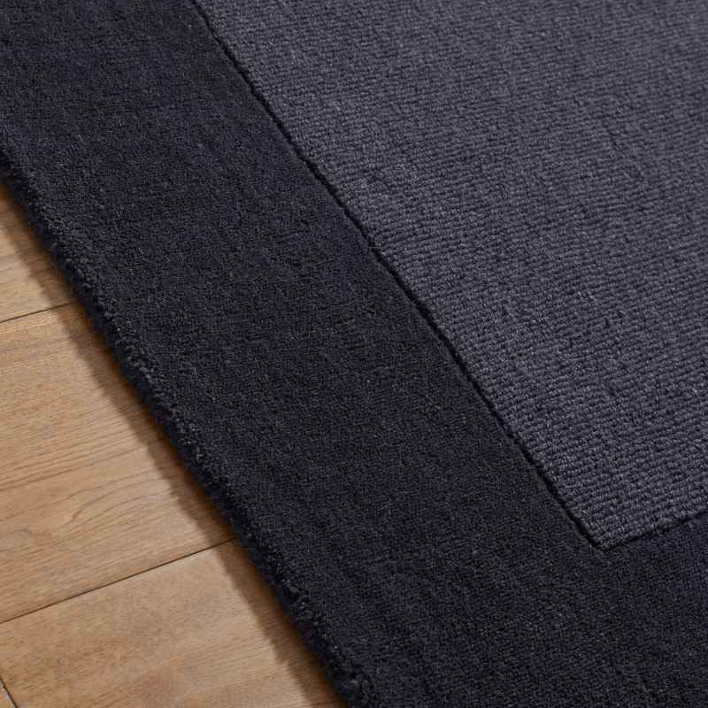 Colours Bordered Wool Rug in Charcoal Grey