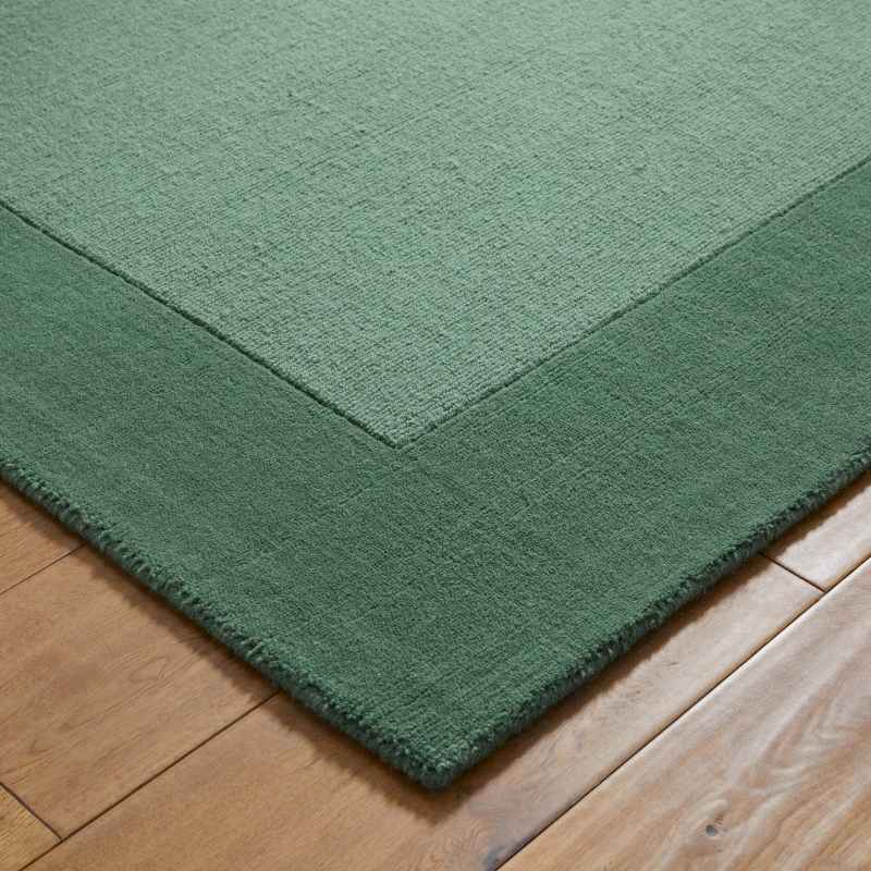Colours Bordered Wool Rug in Green