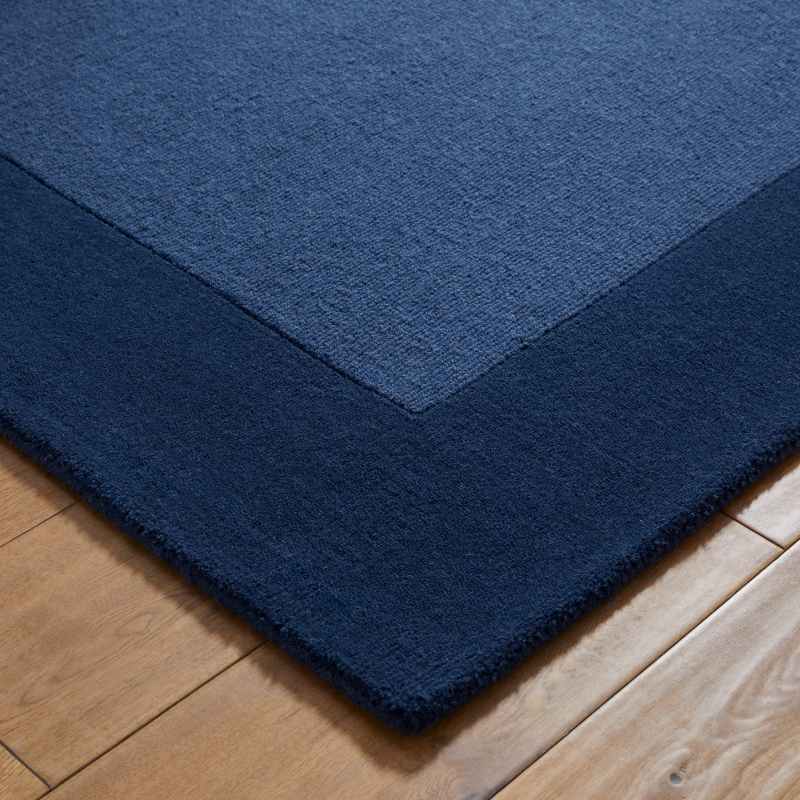 Colours Bordered Wool Rug in Navy Blue