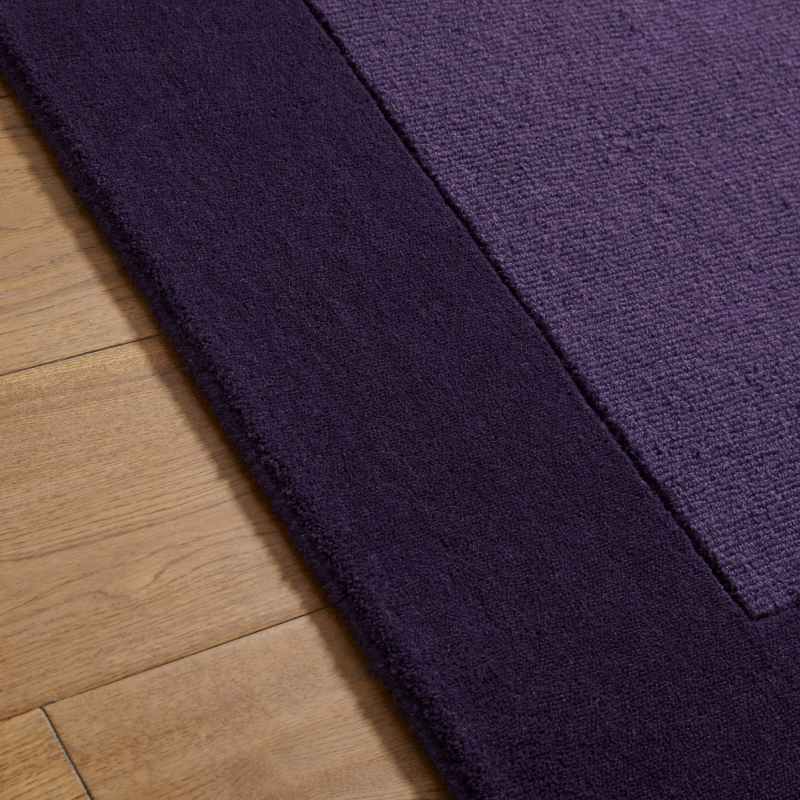 Colours Bordered Wool Rug in Purple