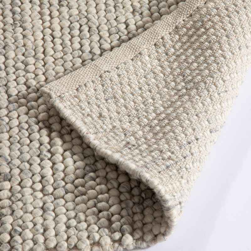 Delilah Mayfair Motted Pebble Wool Rugs in Cream