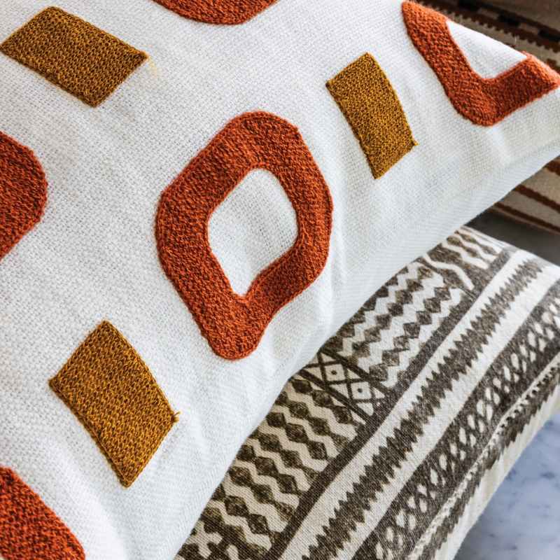 Maakola Geometric Cushion by William Yeoward in Spice Orange