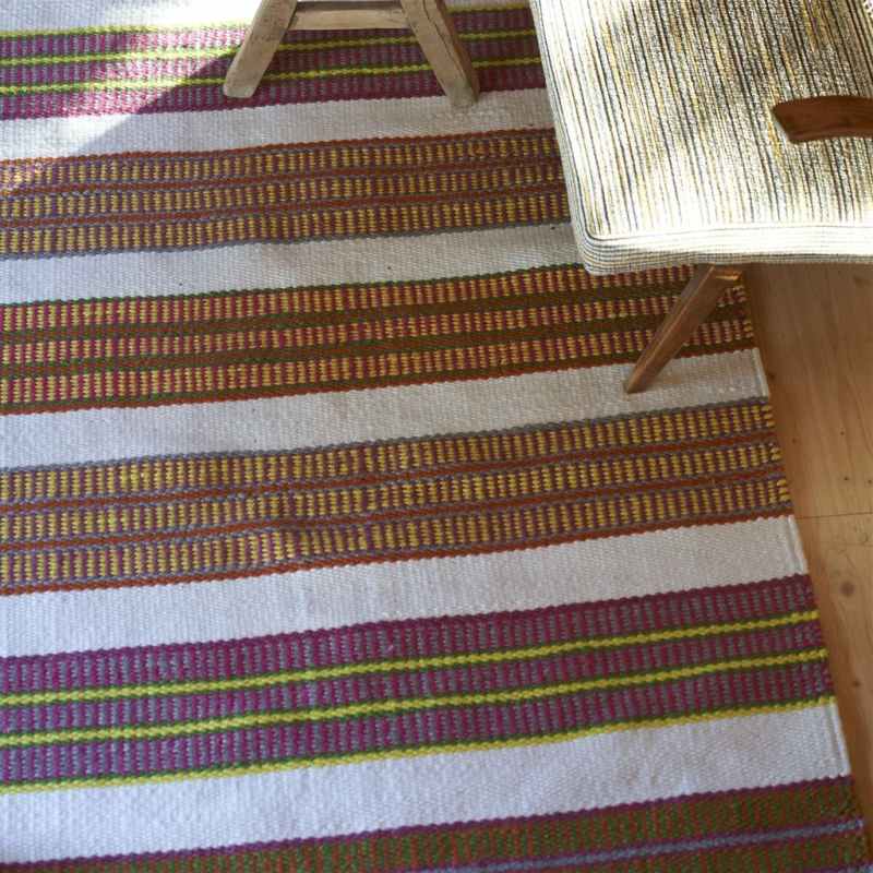 Mahakam Stripe Indoor Outdoor Rug by Designers Guild in Coral Pink