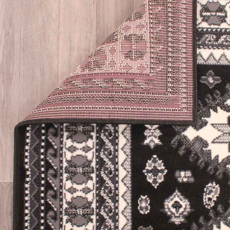 Malak Rugs in Black by Rugstyle