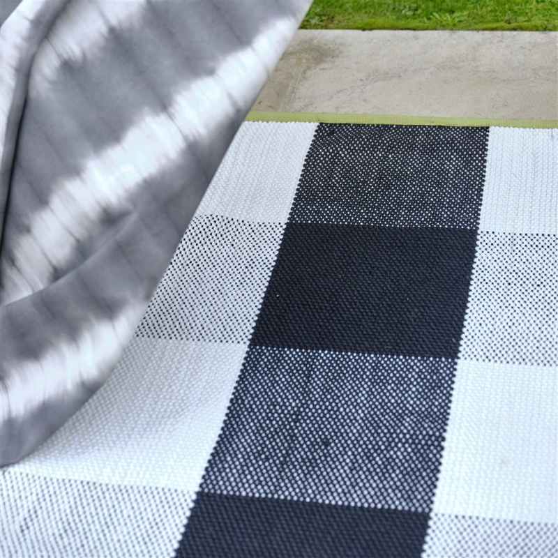 Saliya Check Indoor Outdoor Rug by Designers Guild in Noir Black