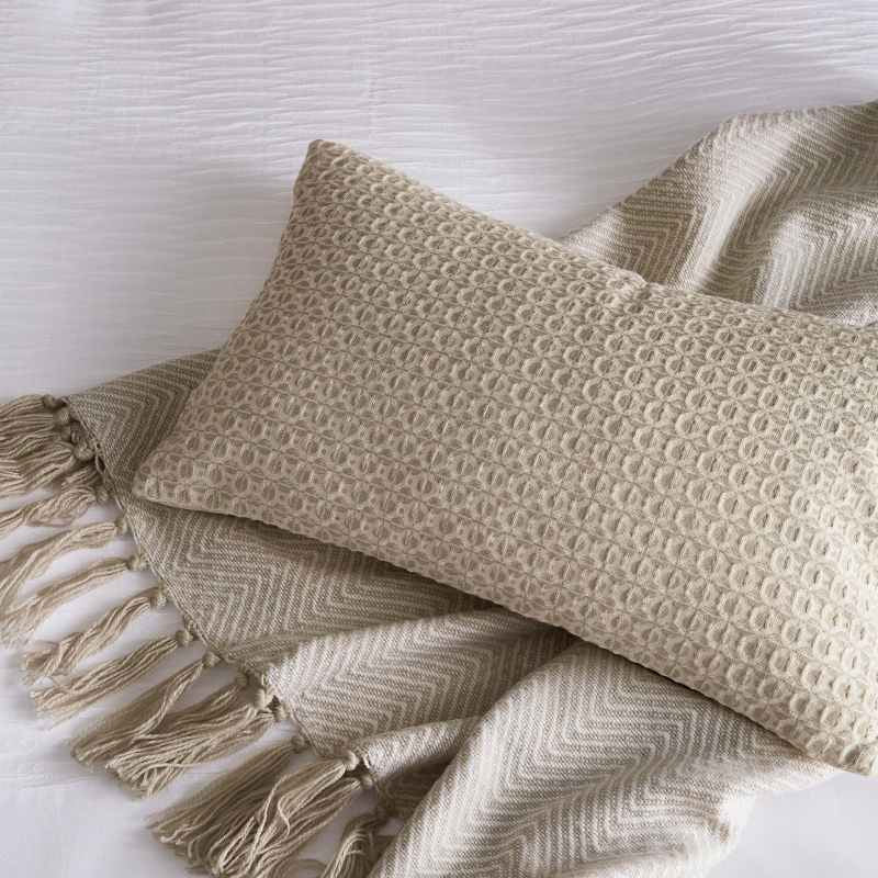 Serenity Herringbone Woven Throw by Katie Piper in Linen