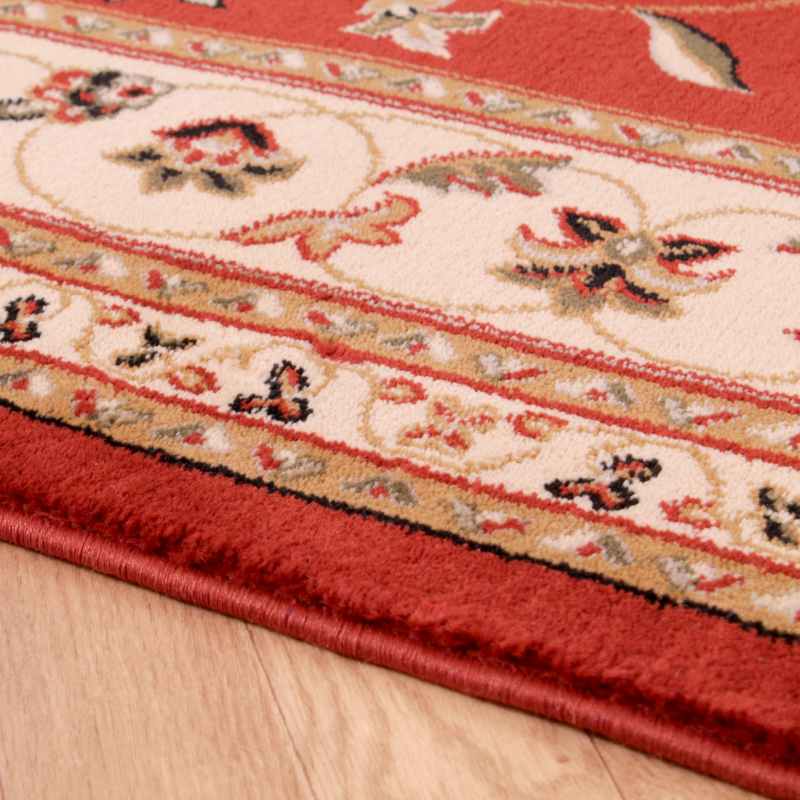 Sherborne Traditional Bordered Rugs in Terracotta Orange
