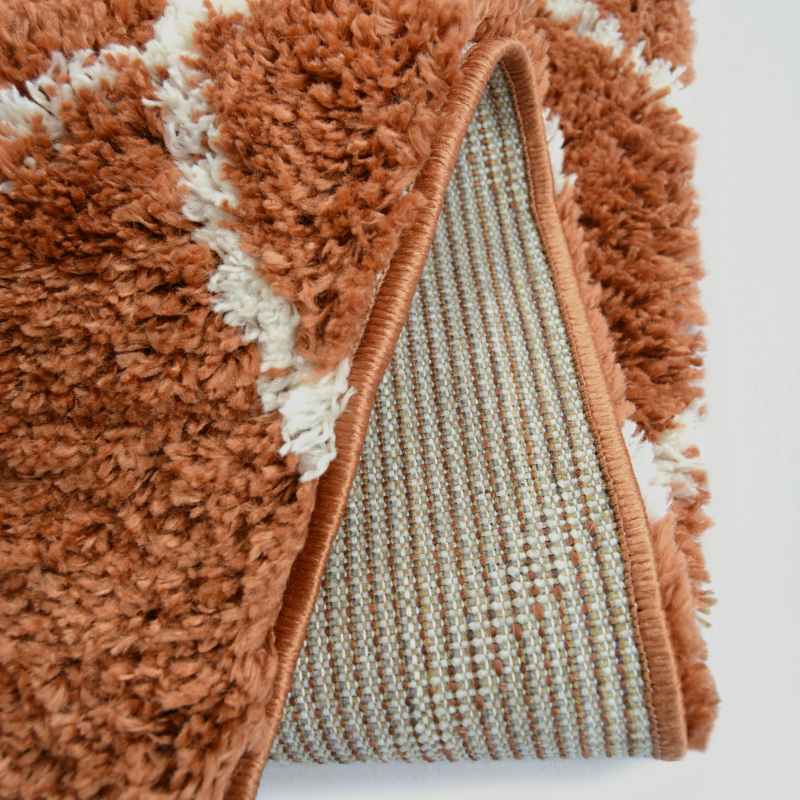 Snug Nomadic Shaggy Geometric Rugs in Terracotta Orange