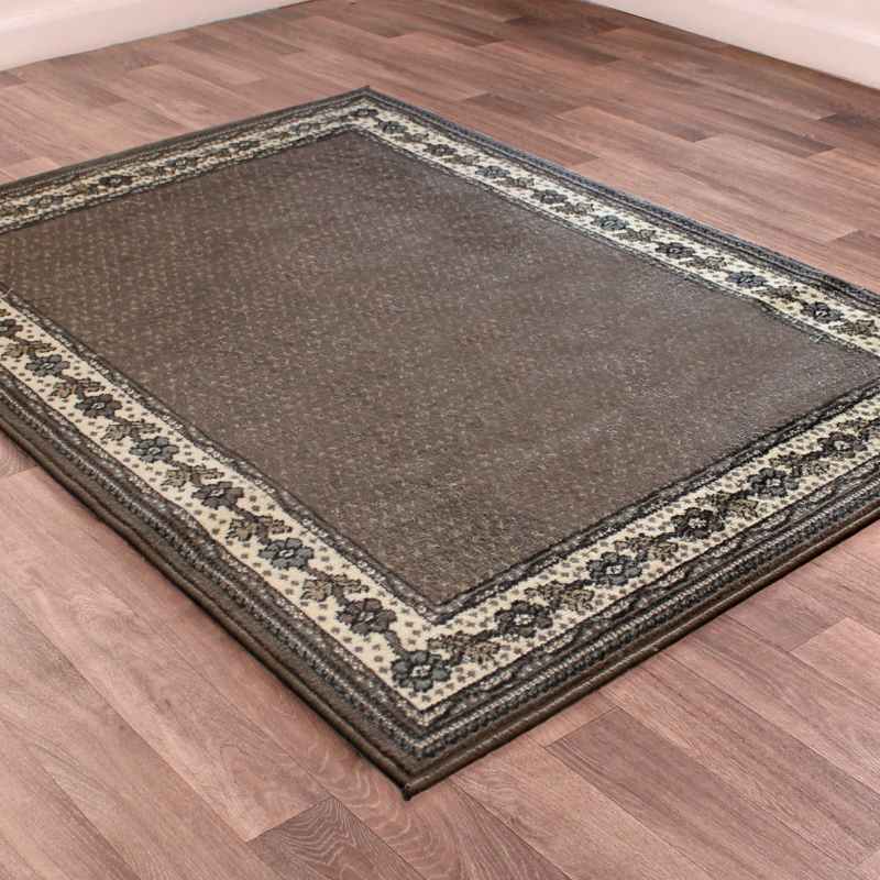 Valencia Plain Bordered Rugs in Chocolate Brown