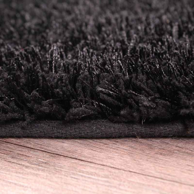 Whisper Shaggy Rugs in Black by Rugstyle