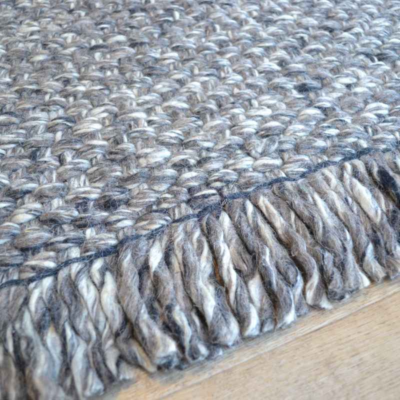 Bergen Plain Tassel Wool Rugs in Charcoal Grey
