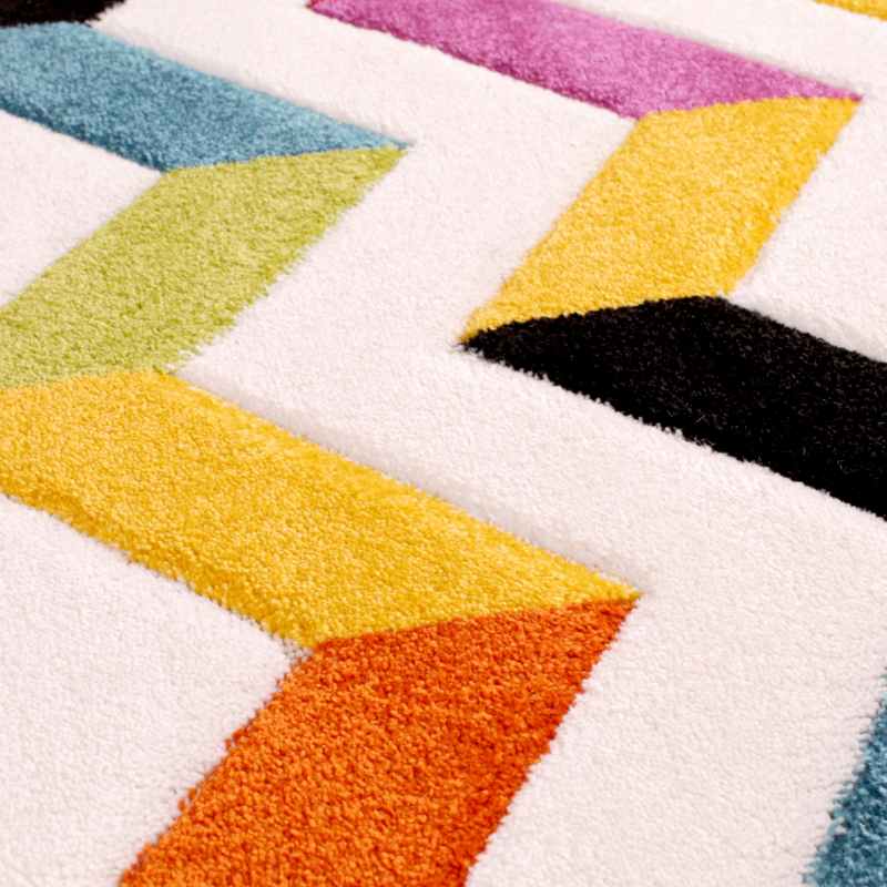 Spectra Coral Carved Chevron Modern Circle Rugs in Multi