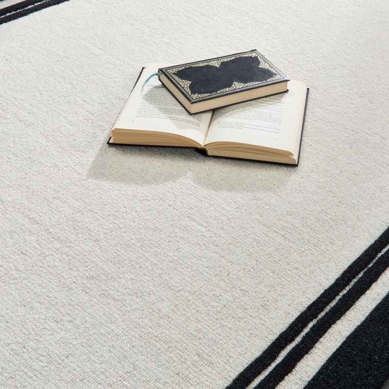 Origins Piper Plain Border Wool Rugs in Monochrome