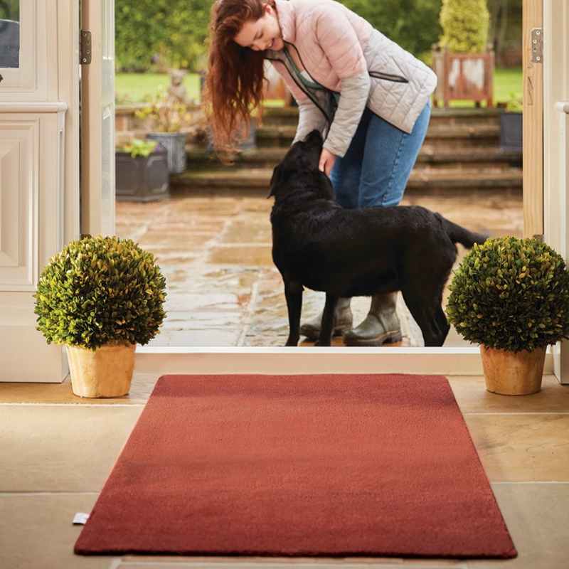 Plain Fleck Washable Hug Rug Doormat in Terracotta