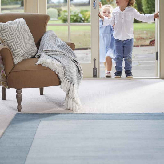 Origins Borders Plain Wool Rugs in Duck Egg Blue