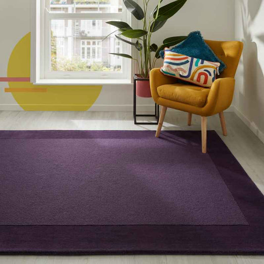Colours Bordered Wool Rug in Purple