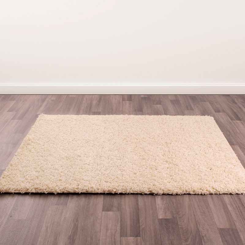 Indulgence Plain Shaggy Rugs in Ivory White