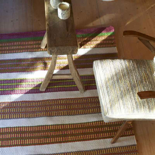 Mahakam Stripe Indoor Outdoor Rug by Designers Guild in Coral Pink