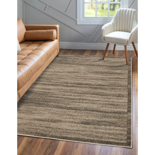 NEWPORT TEXTURED BORDER TAUPE RS