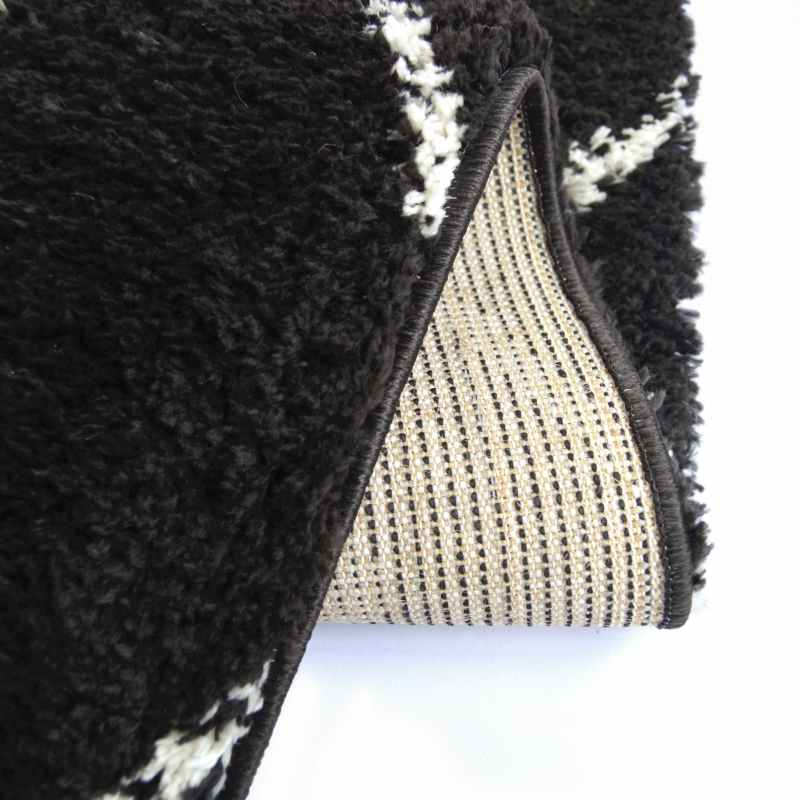 Snug Nomadic Shaggy Geometric Rugs in Black