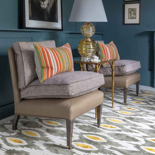 Navinda Designer Wool Rugs in Spice Orange by William Yeoward